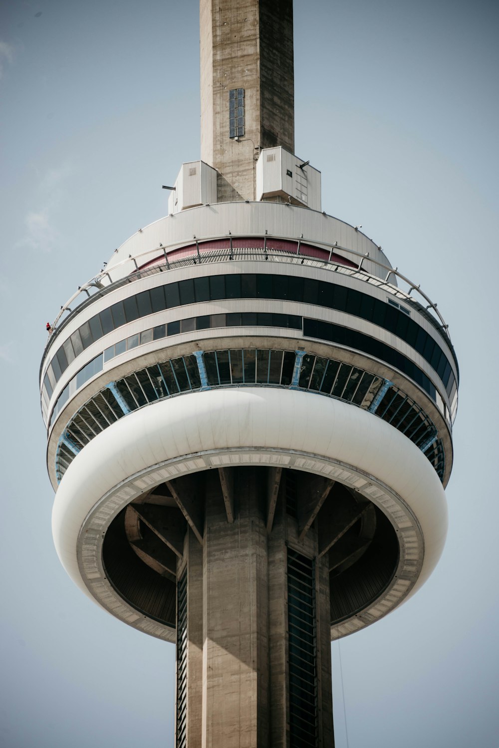 a very tall tower with a clock on it's side