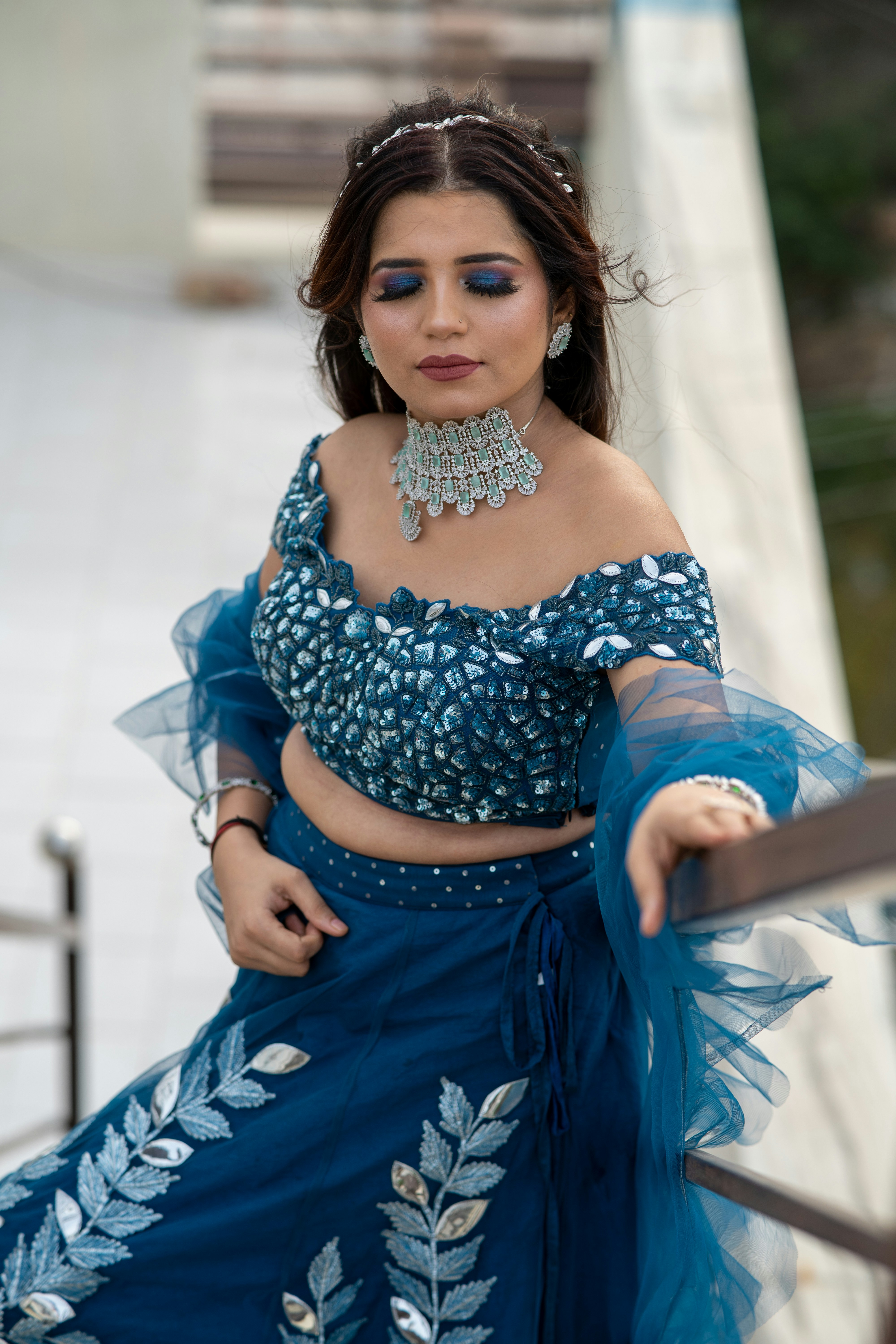A woman in a blue dress posing for a picture photo – Free Barmer Image ...