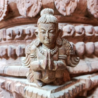 A detailed wooden sculpture reflecting craftsmanship and design.