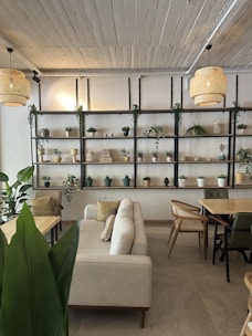 A warm beige-toned living room with minimalist furniture and soft lighting, perfectly reflecting a modern cozy home.