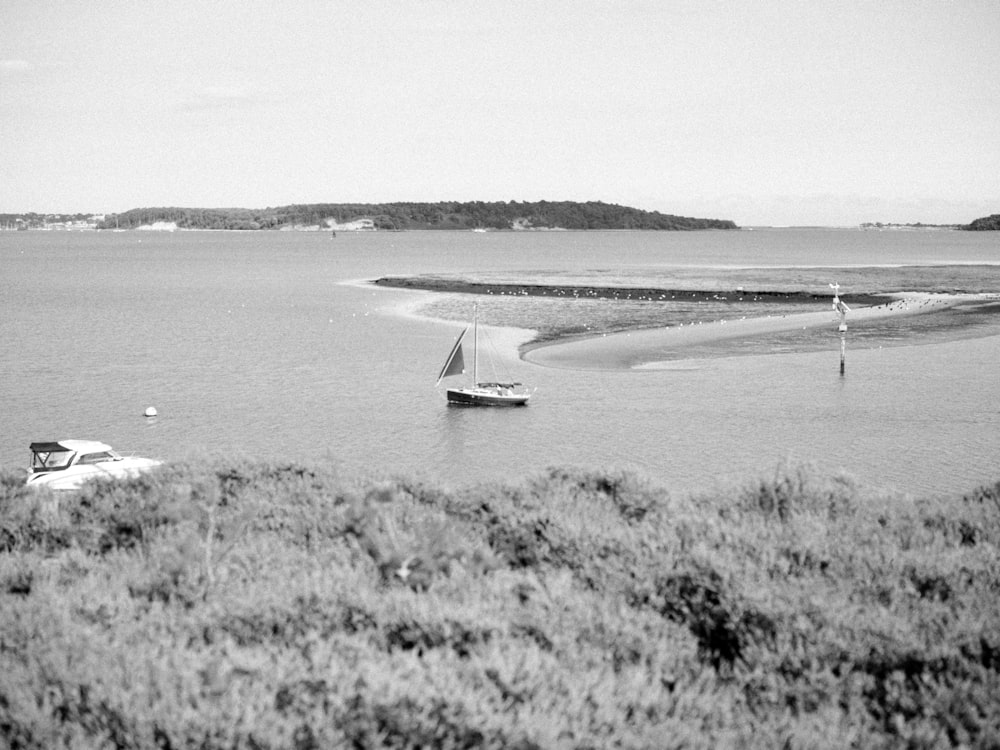 a small boat is out on the water