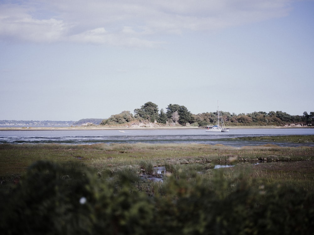 a boat is out on the water in the distance