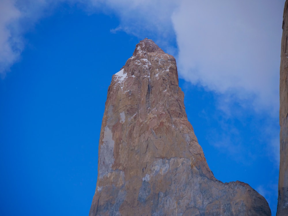 a very tall mountain towering into the sky