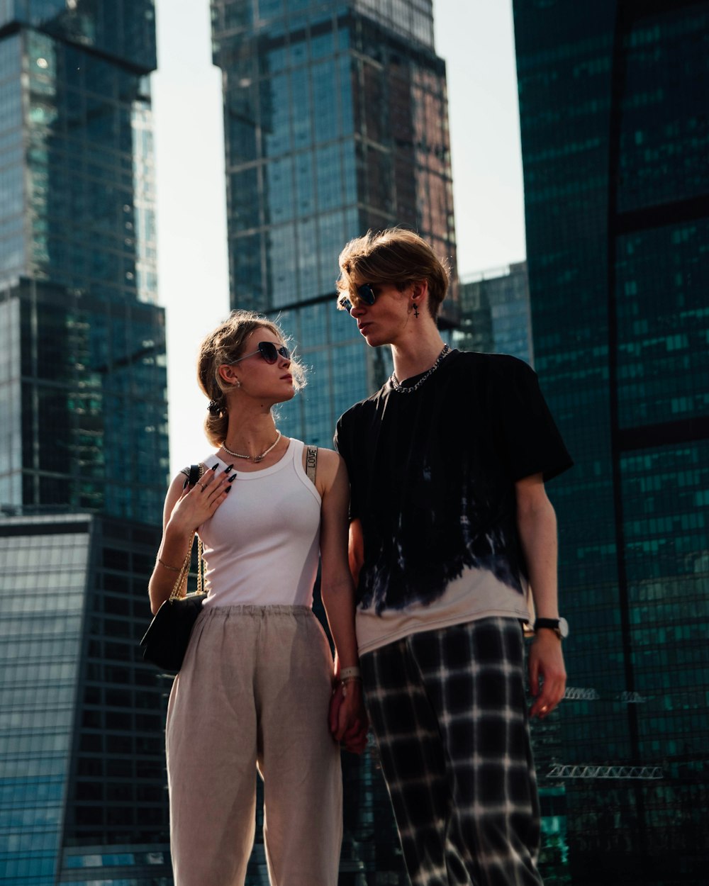 a man and woman standing next to each other