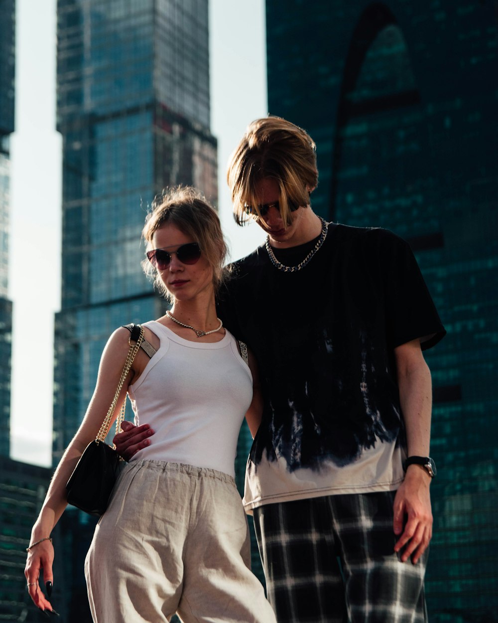 a man and a woman walking down a street