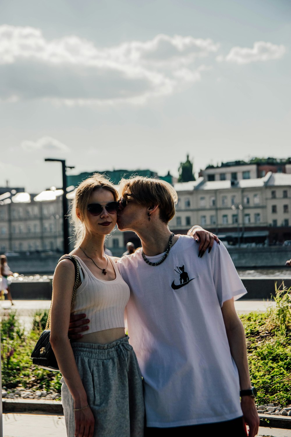 a man and a woman standing next to each other