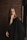 a woman in a black dress posing for a picture