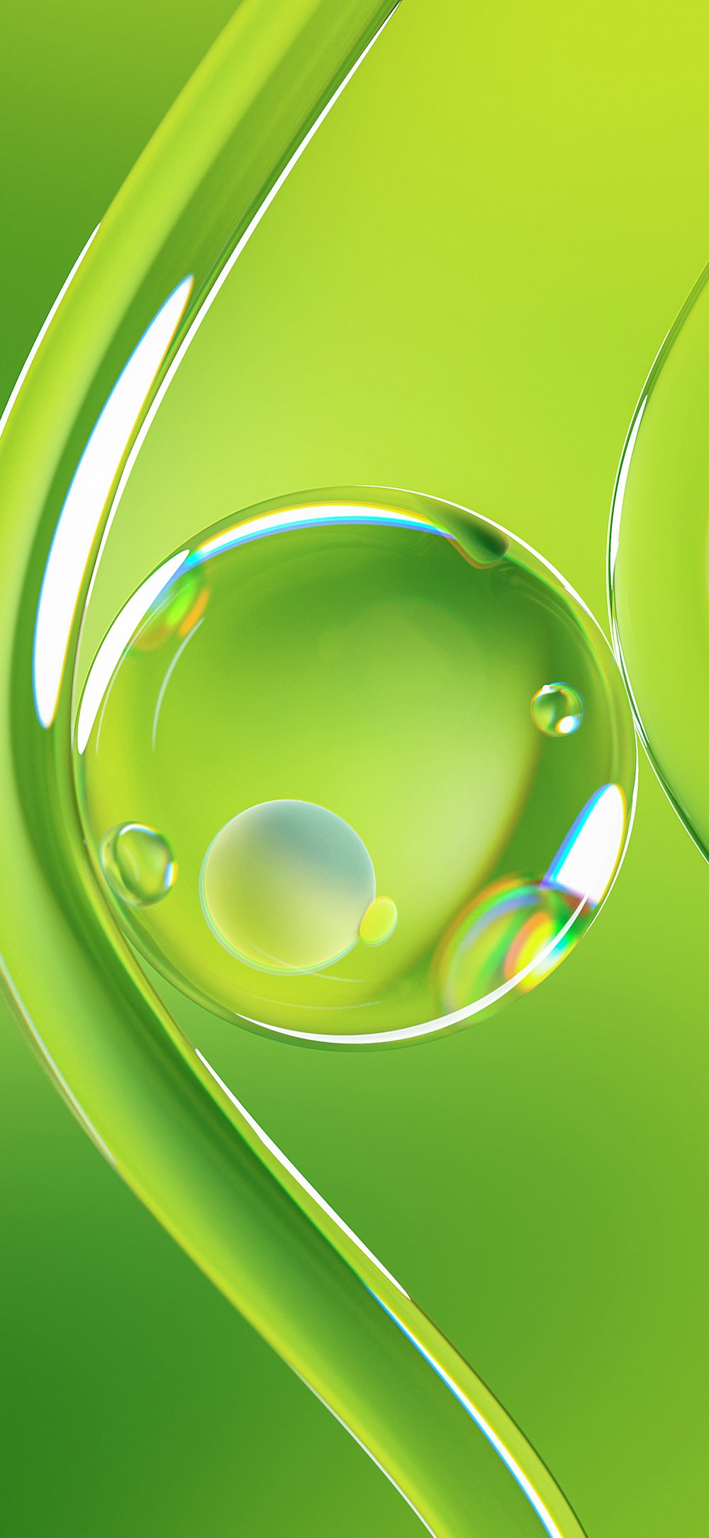 a close up of a drop of water on a green surface