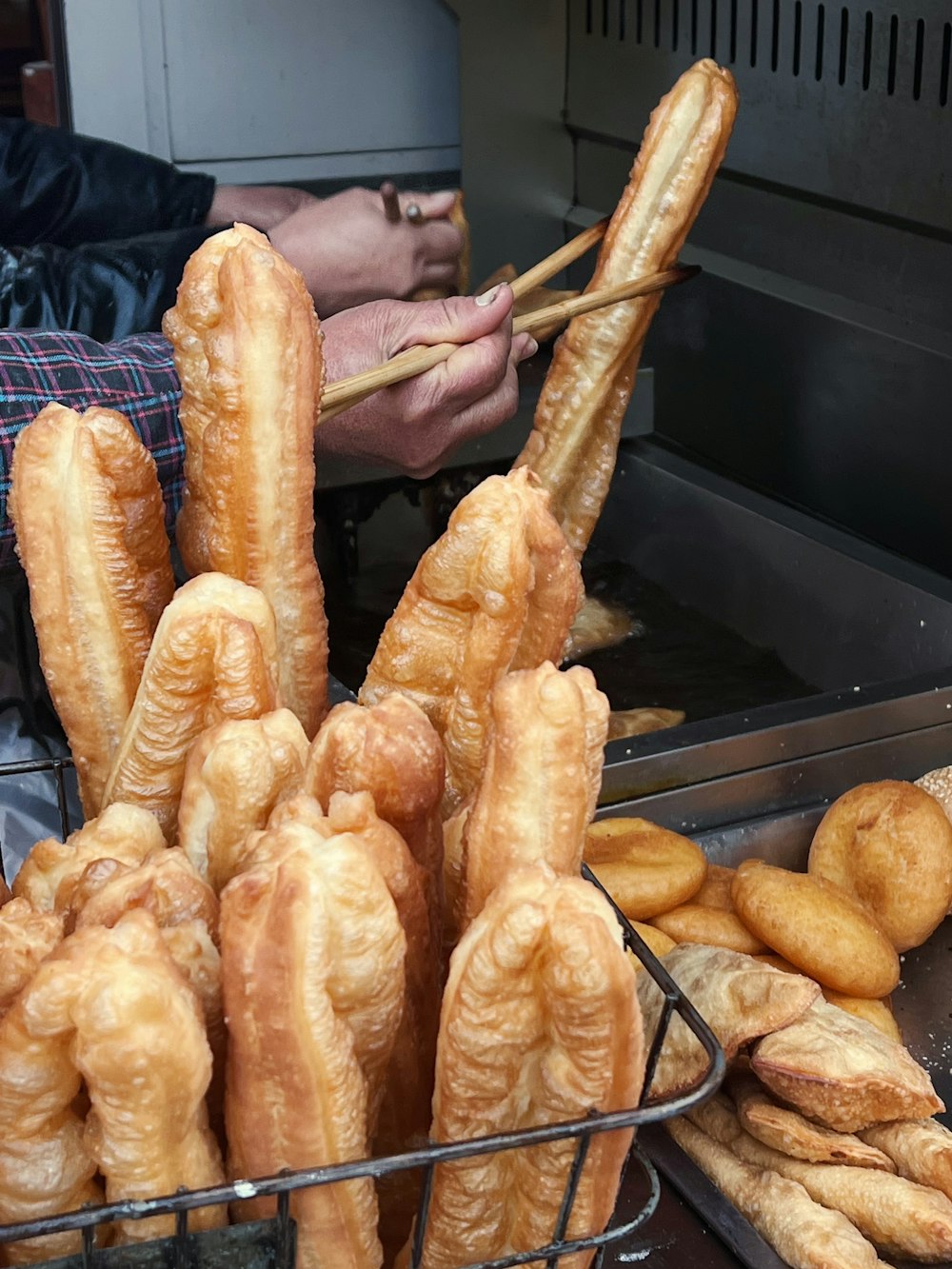 a bunch of bread sticks that are in a basket