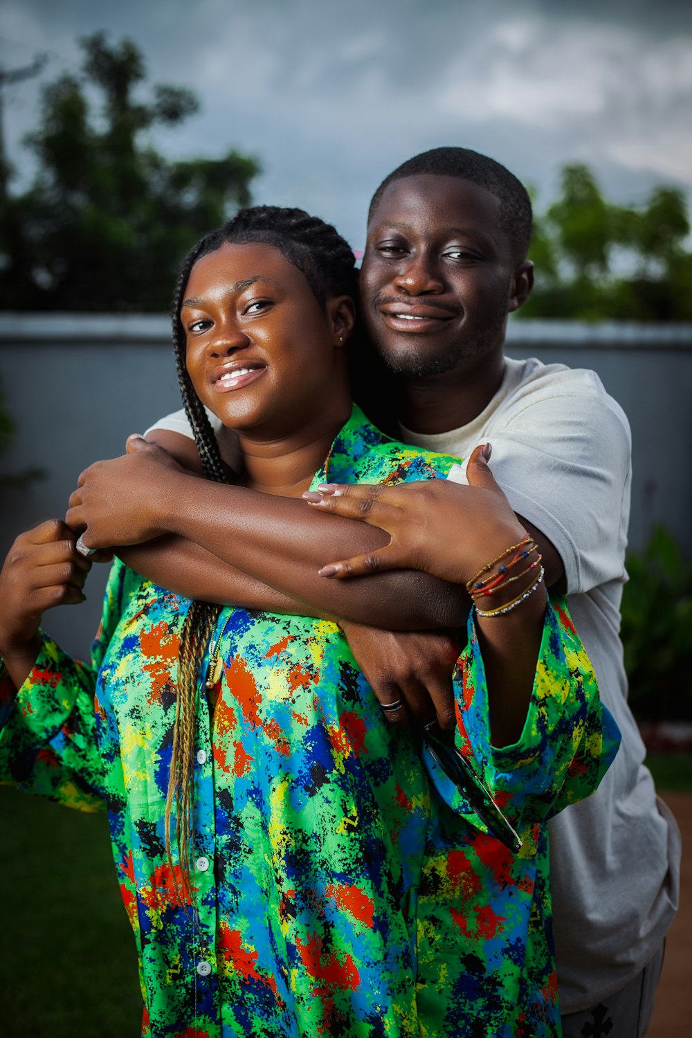 a man and a woman hugging each other