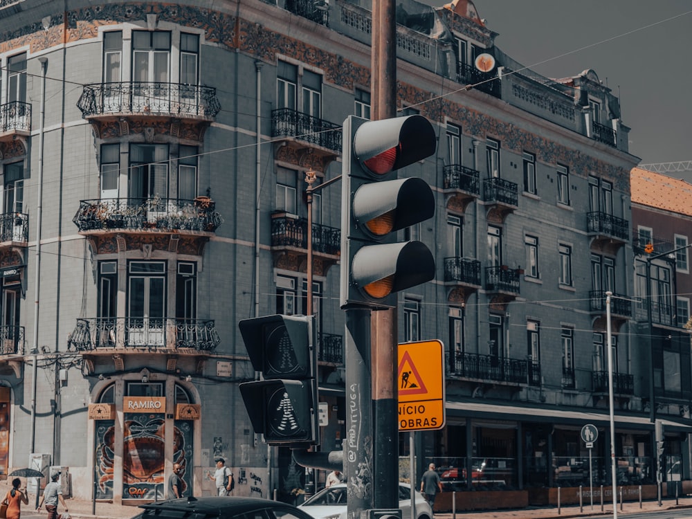 a traffic light sitting on the side of a road