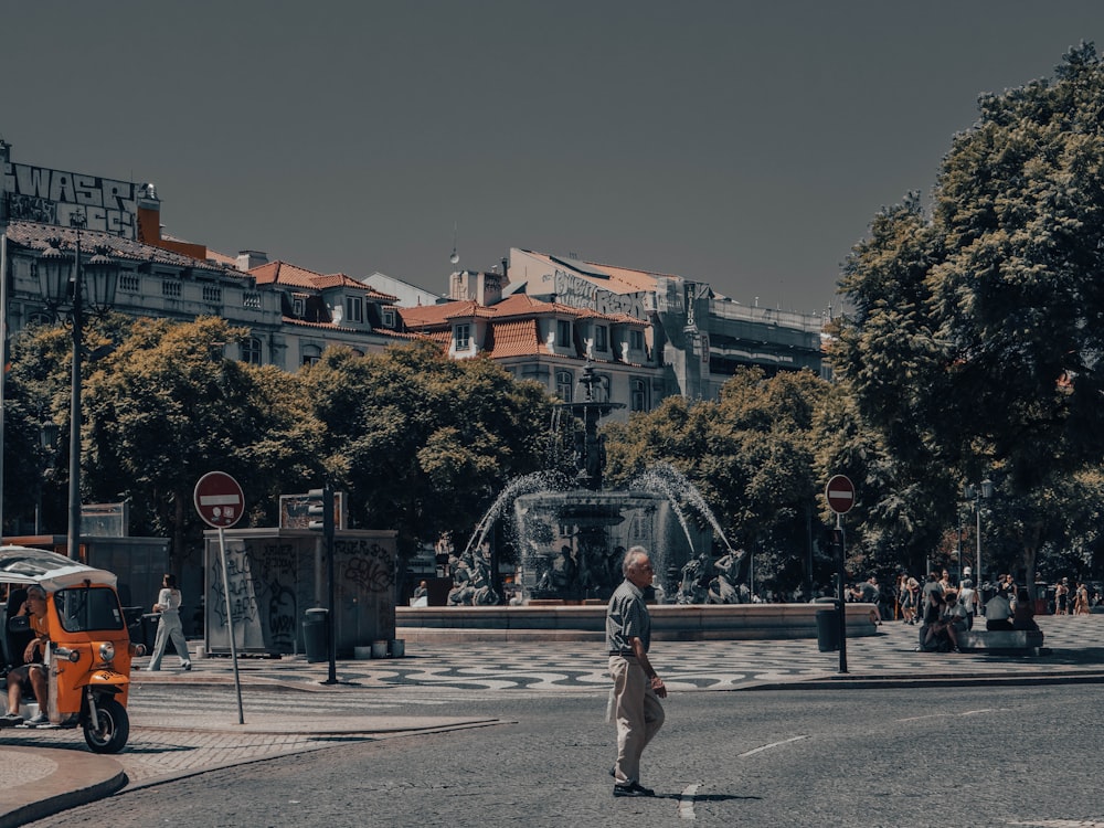 a man standing in the middle of a street