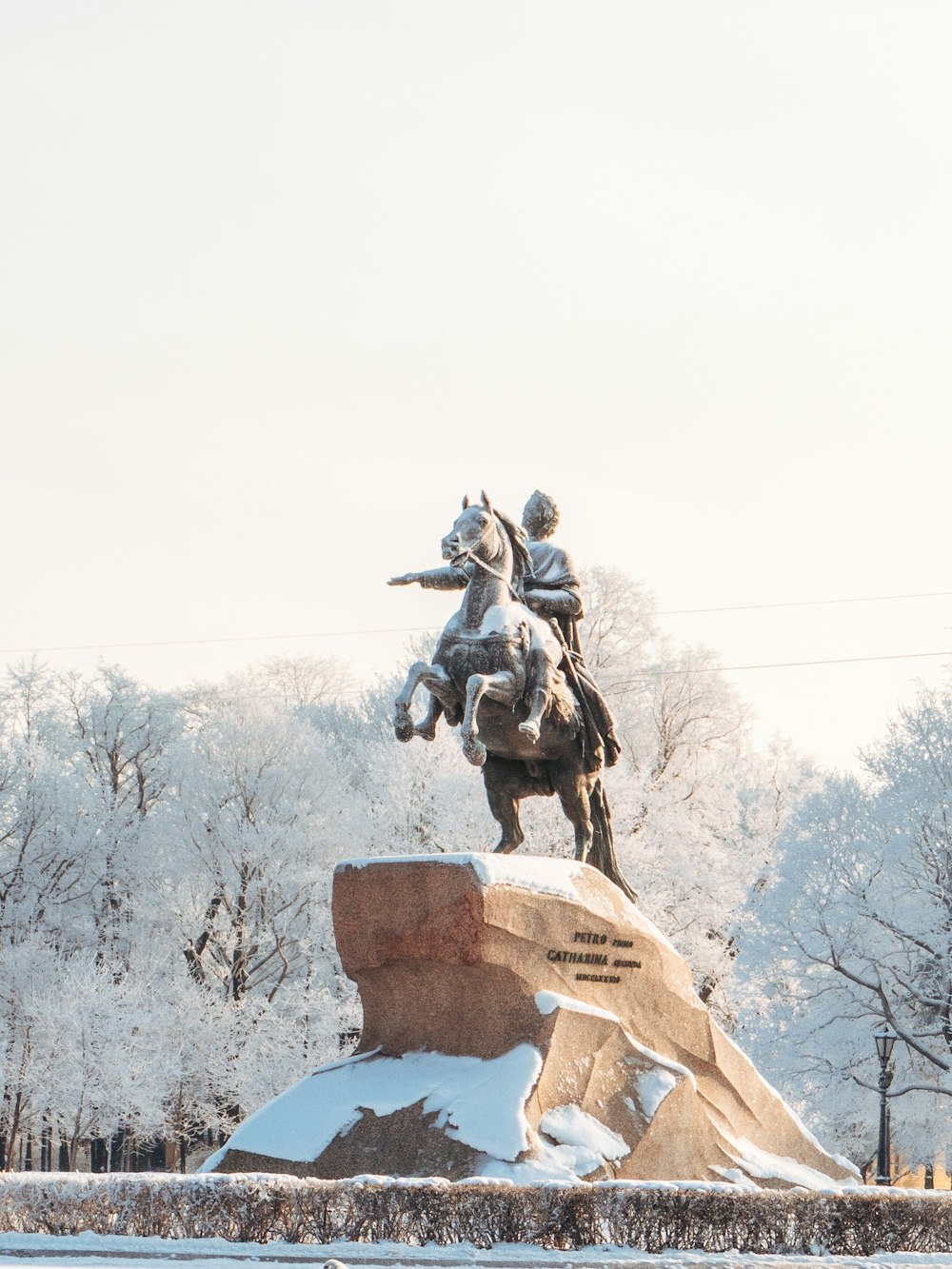 a statue of a man riding a horse