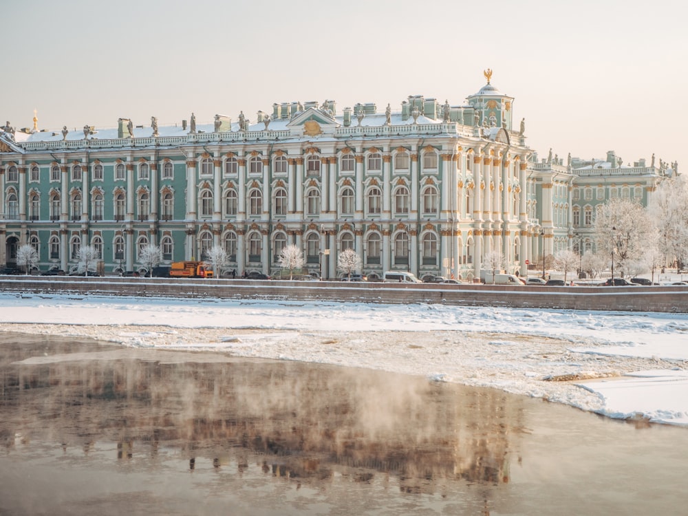 a large building with a lot of snow on the ground