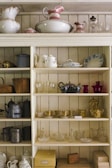 Elegant wooden shelves filled with decorative items.