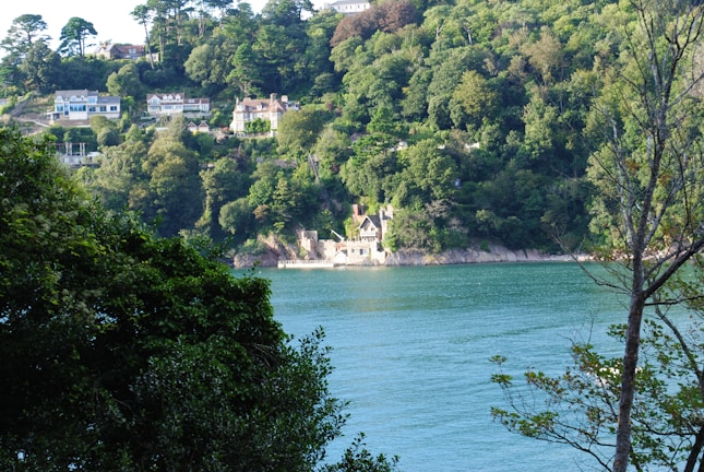 Tranquil view of the Chillón river beach embraced by green hills near Casa Checta.