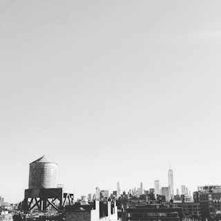 Photograph of London skyline featuring iconic landmarks under a clear sky
