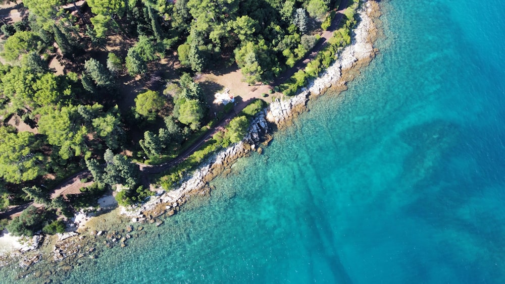 an aerial view of a small island in the middle of the ocean