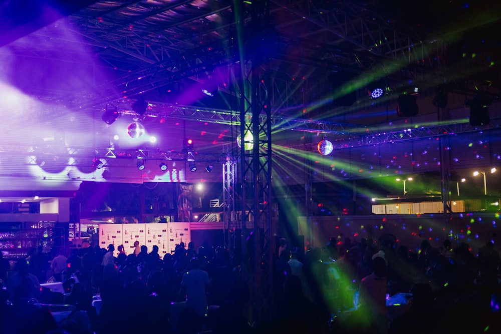 a group of people standing on top of a stage