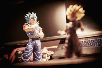 Action figures posed dynamically with a pop culture themed background.
