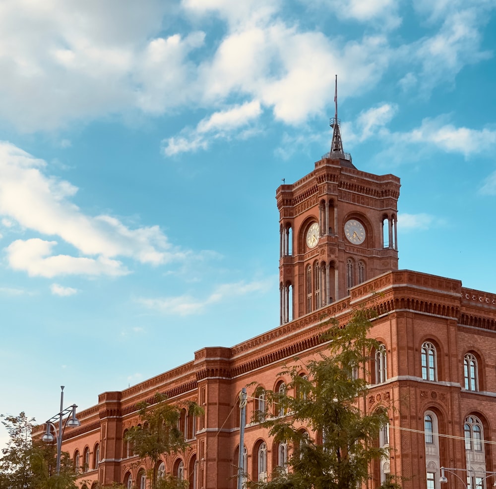 a large building with a clock on the top of it