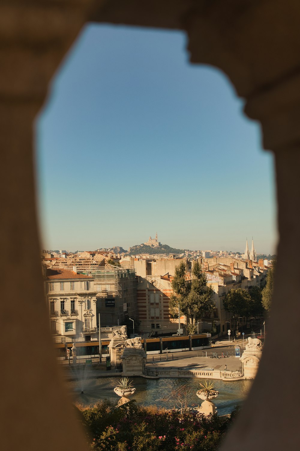 a view of a city from a window in a building