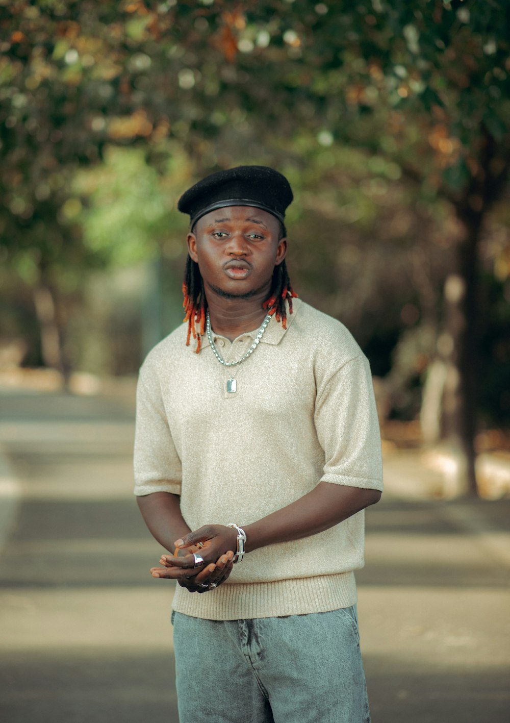 a man standing in the middle of a street