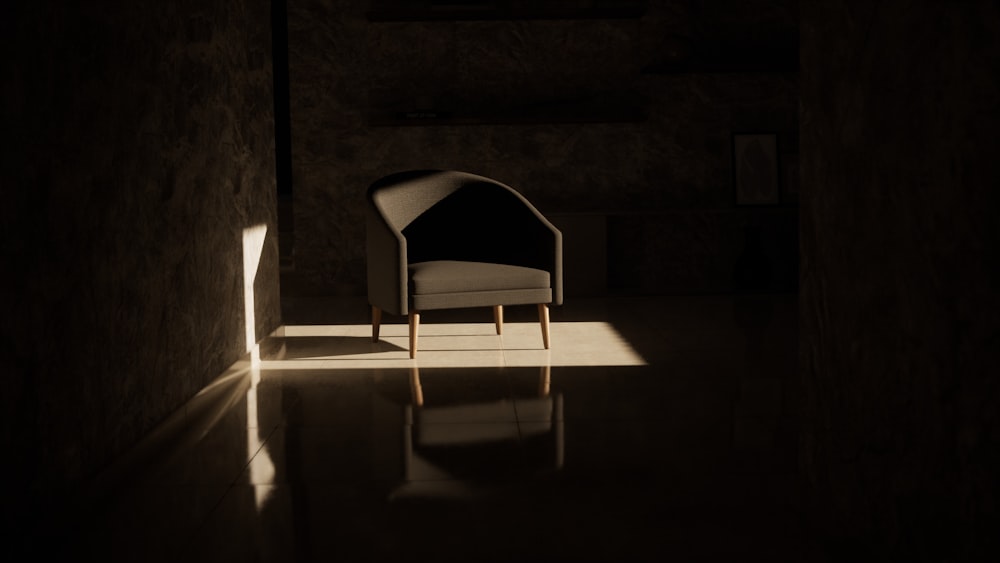 a chair sitting in the middle of a dimly lit room