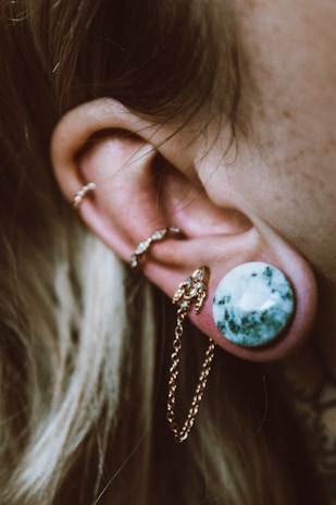 A vibrant display of various body piercings.