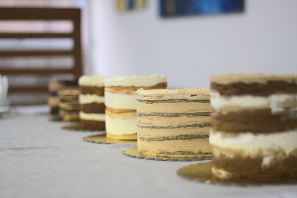 a row of cakes sitting on top of a table