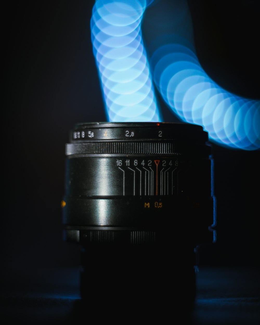 a camera lens sitting on top of a table