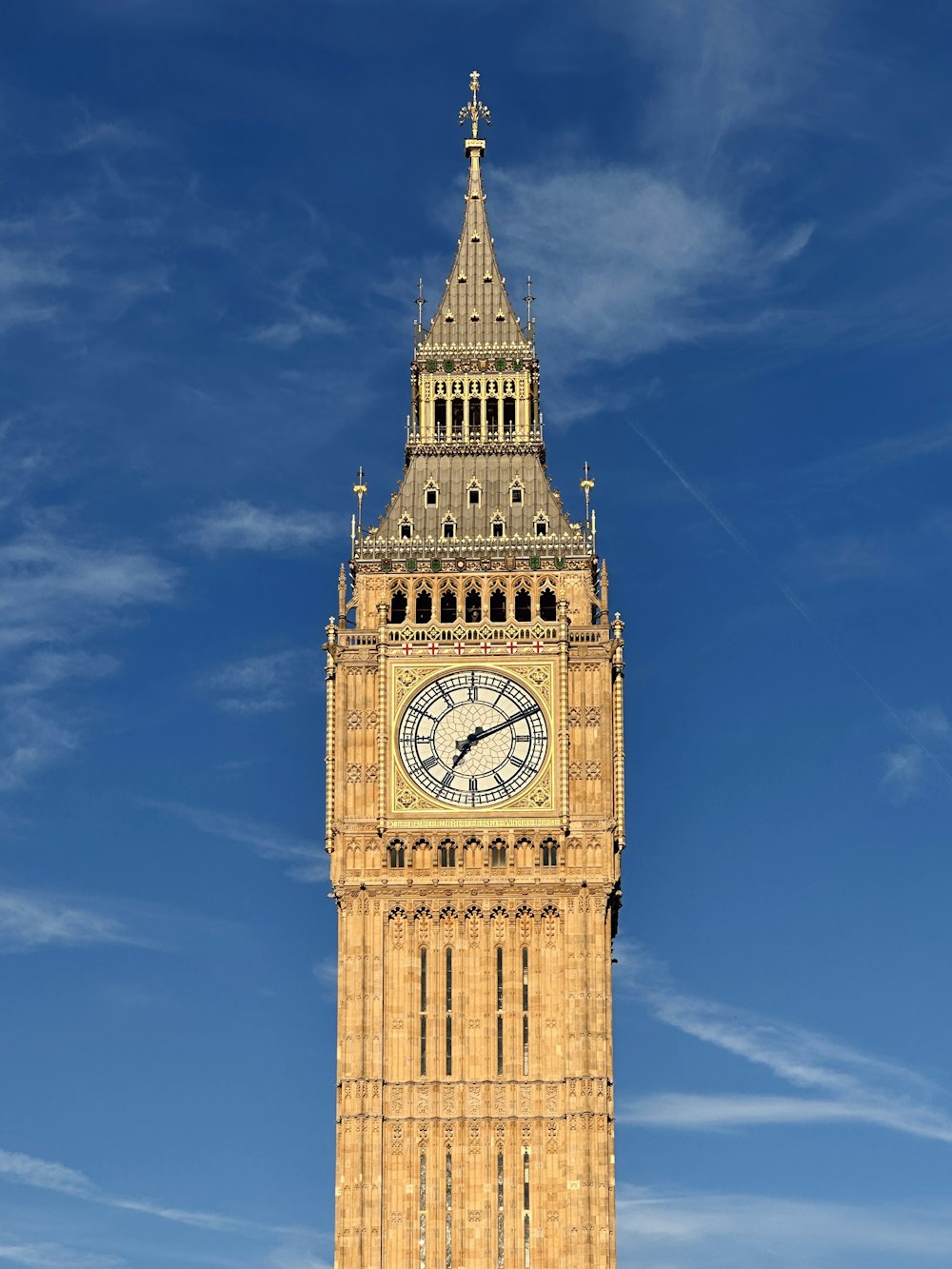 a tall clock tower with a sky background