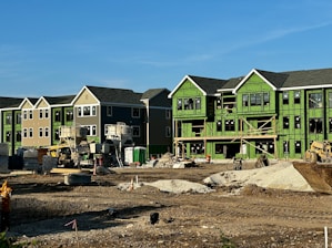 a row of houses under construction in a residential area