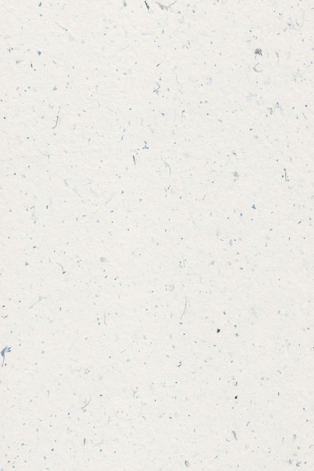 a white background with blue speckles on it