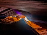 Close-up of the smooth, flowing rock formations shaped by water in Antelope Canyon.