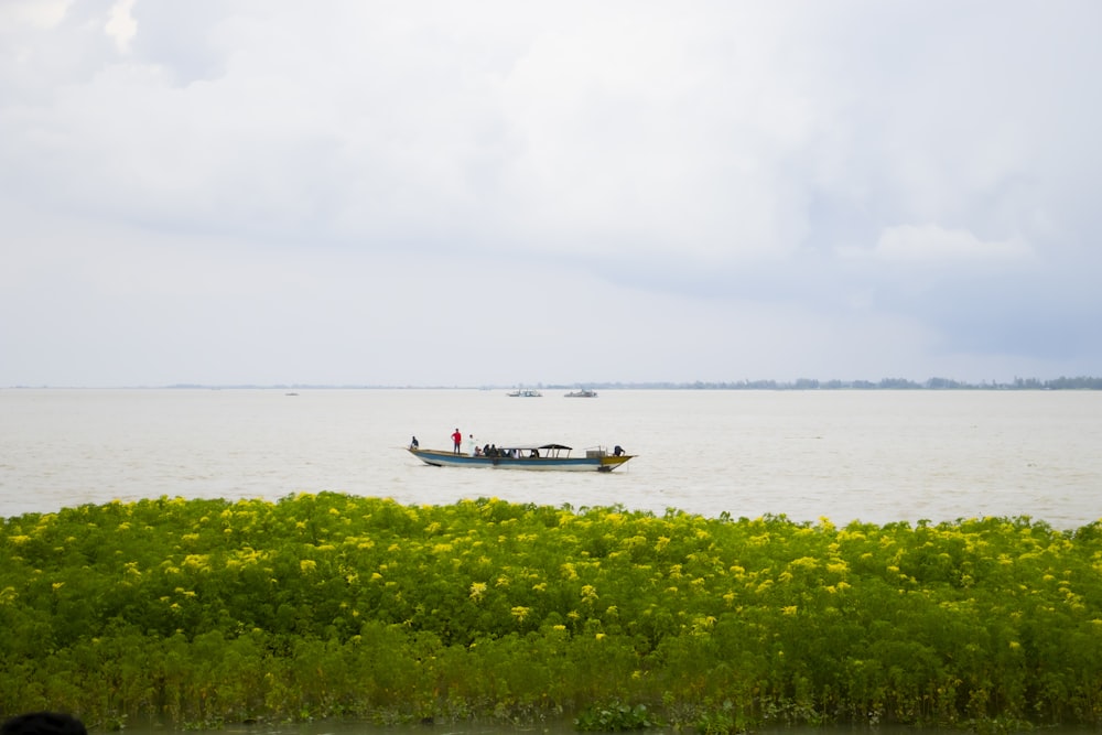 a small boat in a large body of water