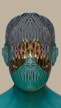 A digitally rendered face exhibiting a metallic and abstract texture, with distorted and mirrored features. The surface is smooth and reflective, suggesting a futuristic or alien design. Colors are rich and vibrant, with a mix of blue, gold, and hints of red. The image conveys an otherworldly and surreal appearance due to the unique texture and symmetry.