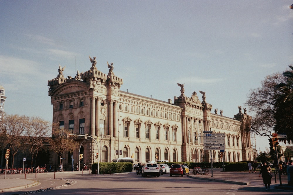 a large building with statues on top of it