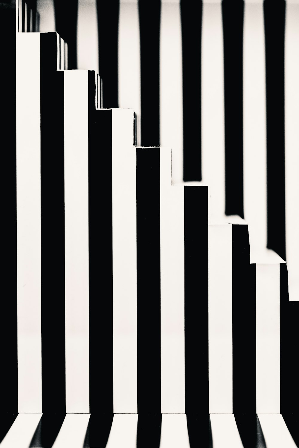 a black and white photo of a number of vertical lines