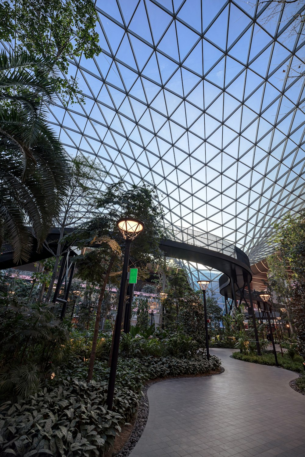 the inside of a building with a glass roof