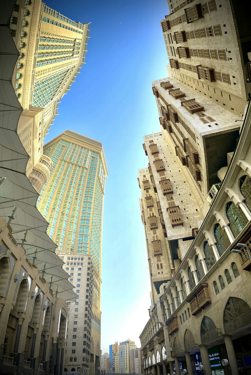 looking up at the buildings in the city