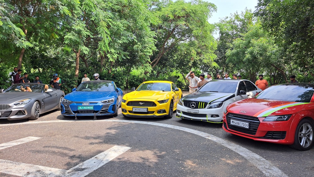 a group of cars parked next to each other in a parking lot