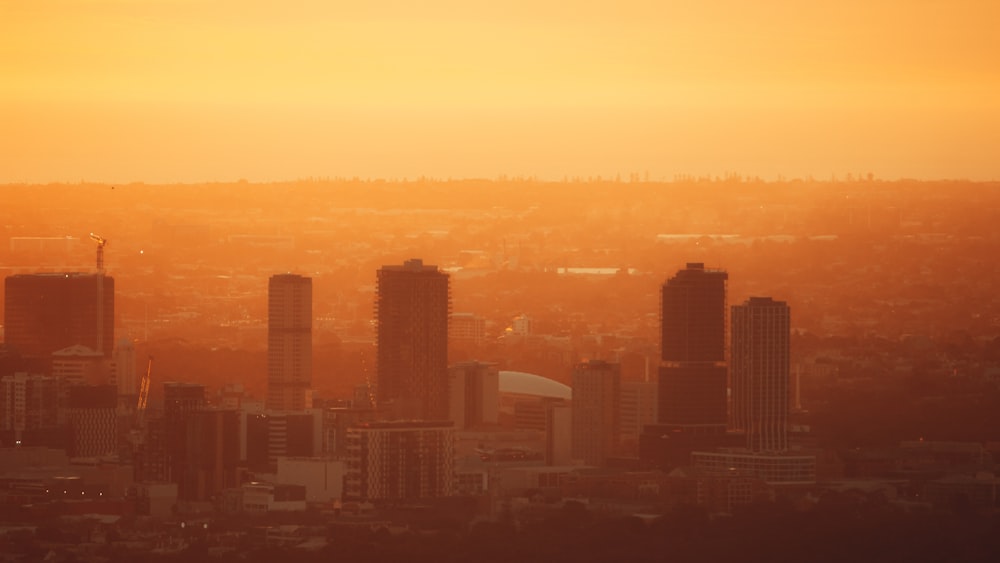 a view of a city with tall buildings