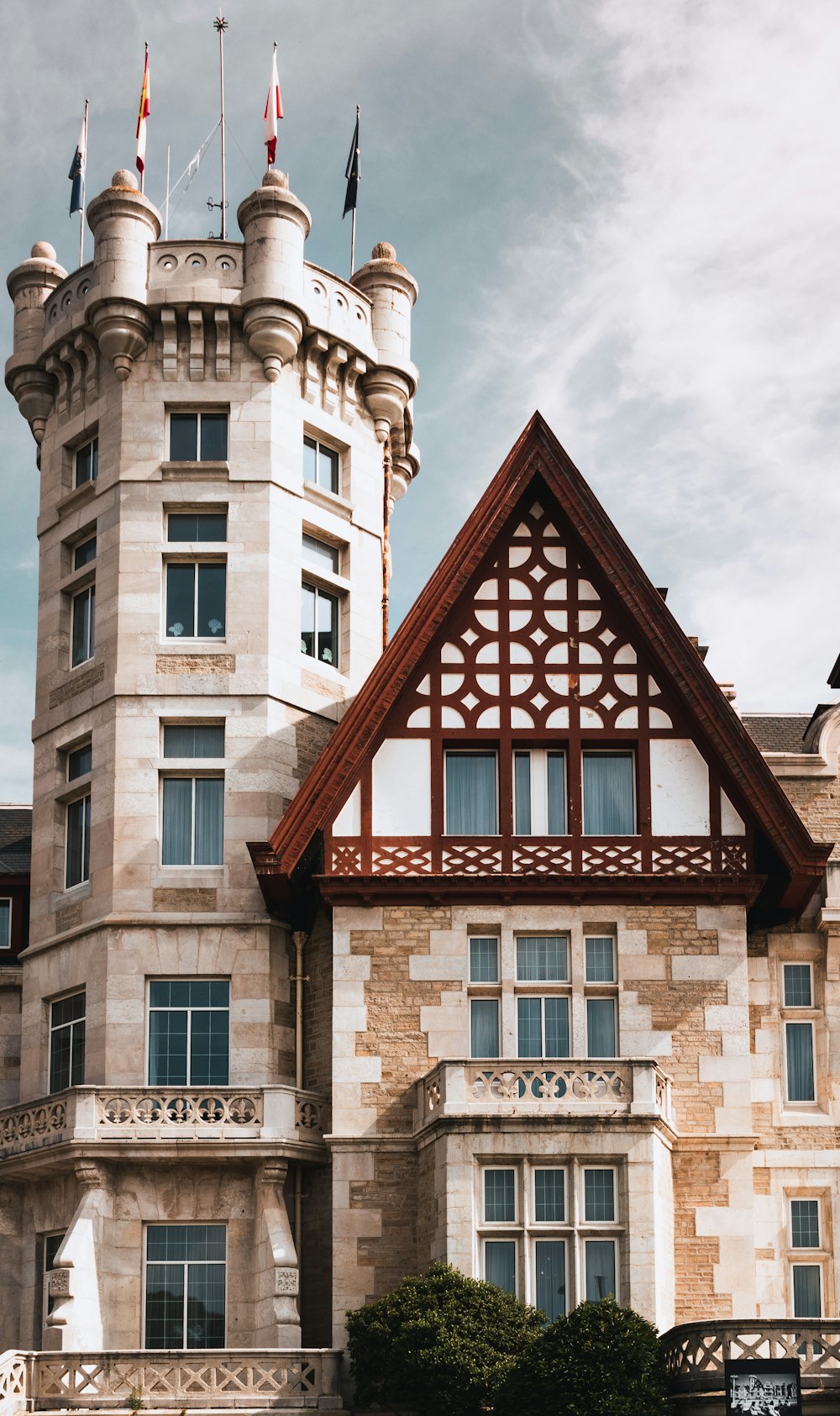 a tall building with a clock on the front of it