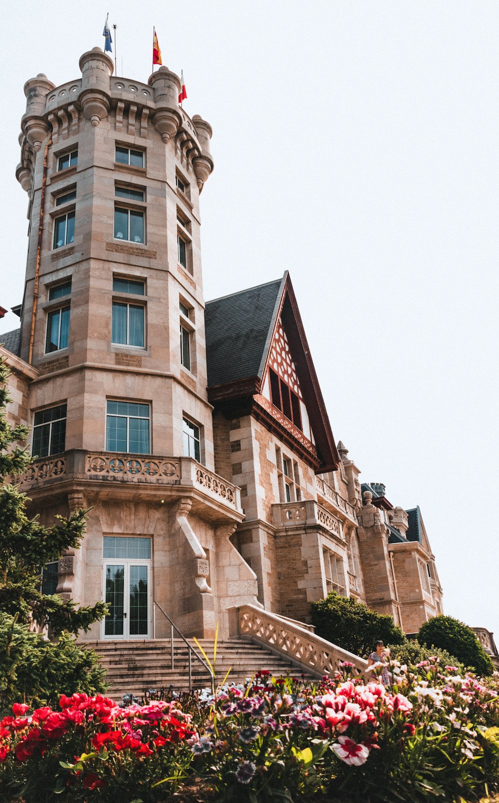 a tall building with a clock on the top of it