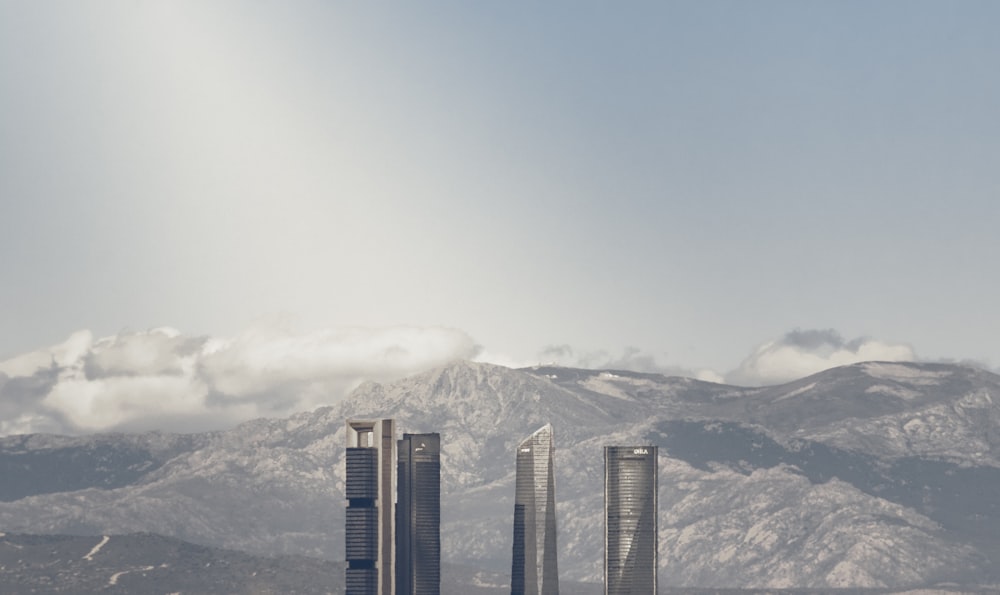 a view of a city with mountains in the background