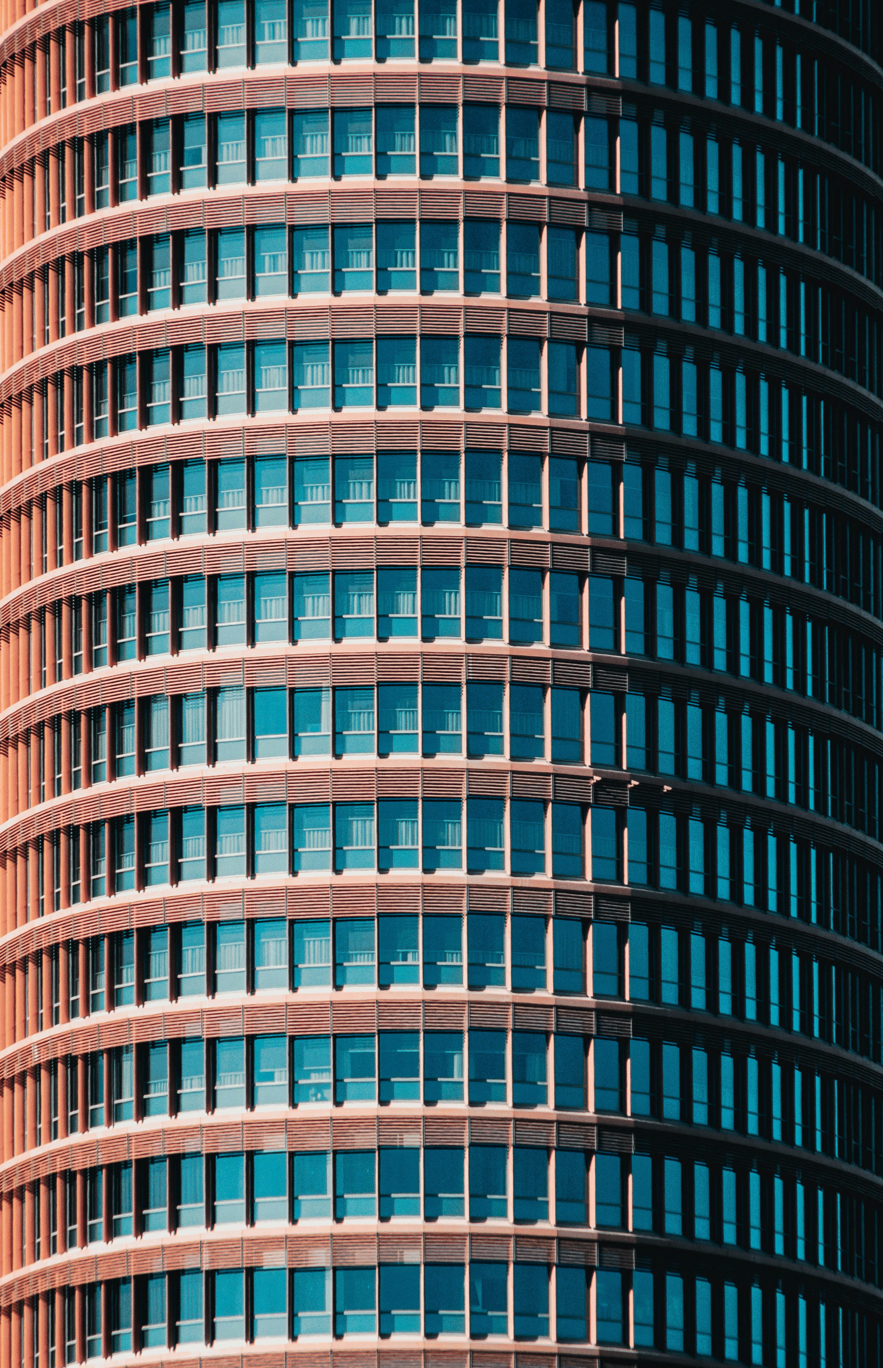 a tall building with lots of windows on top of it