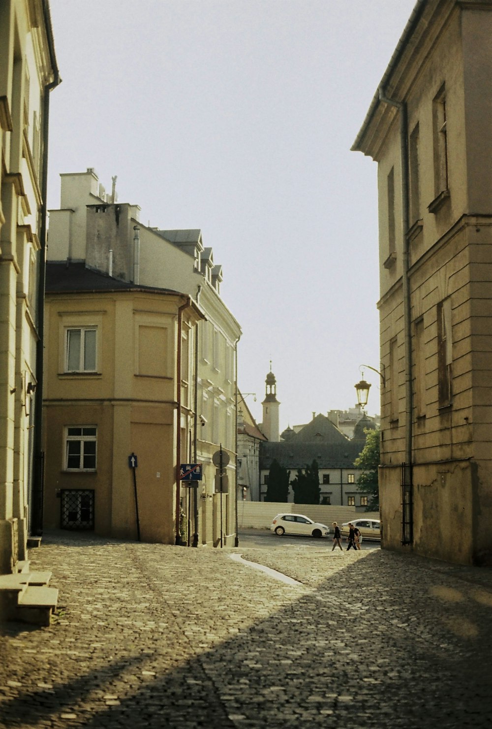 a cobblestone street in a european city