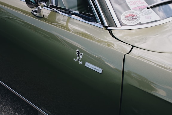 a close up of a car with a sticker on it