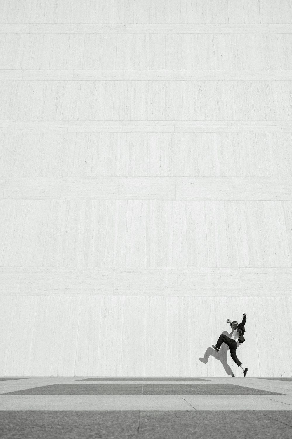 a person jumping in the air on a skateboard